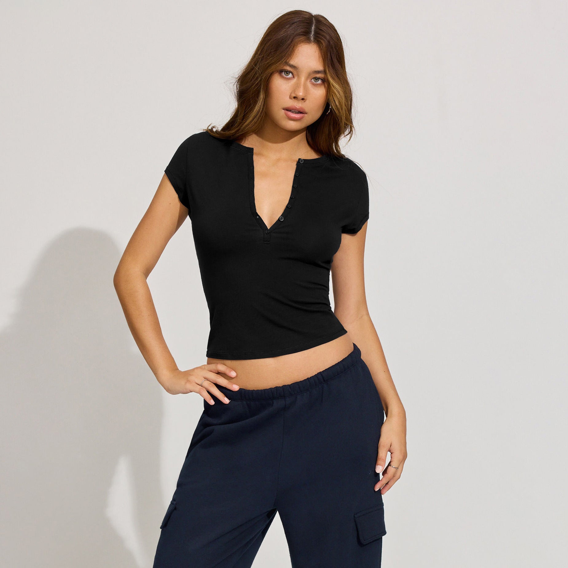 Women’s Solid Color Slim-Fit Deep V Button Top – Chic & Versatile