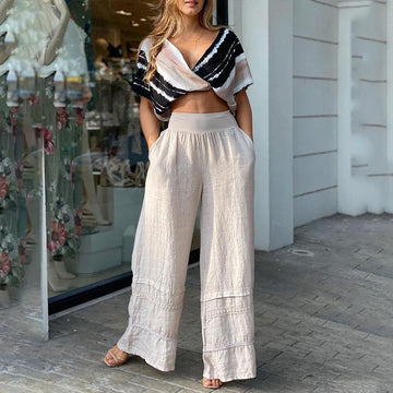 Elegant Two-Piece Suit – V-Neck Crop Top & Flared Pants