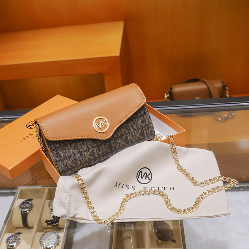 Sac Miss Keith MK – Élégance classique avec chaîne en or et fermeture signature